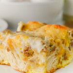 Sausage gravy breakfast casserole on a plate.