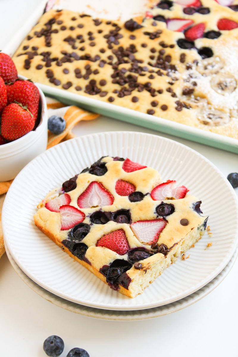 Sheet pan pancakes on a white plate.