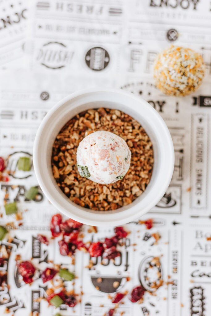 Cheeeballs are rolled in chopped pecans.