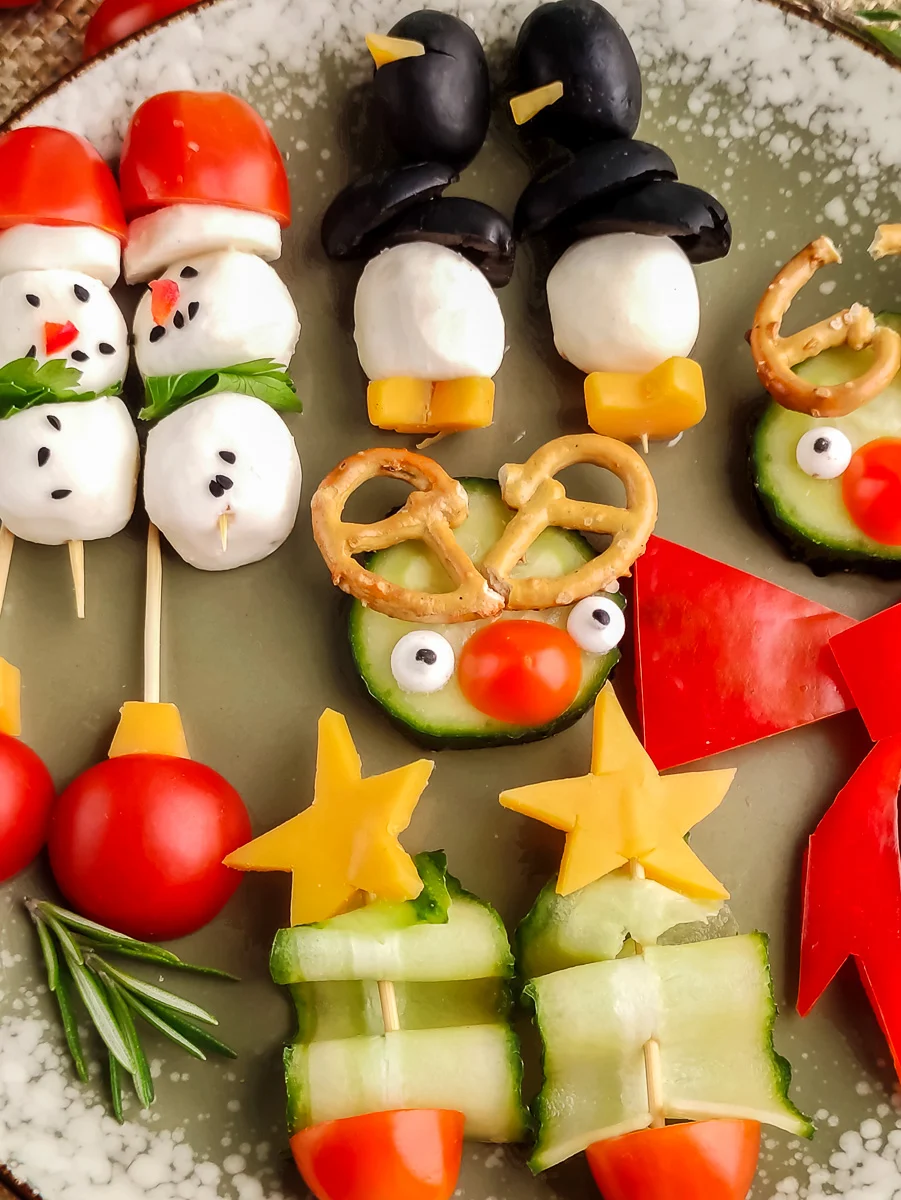 Cute Christmas appetizers served on a plate.