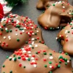 Hocolate caramel pecan clusters on plate.