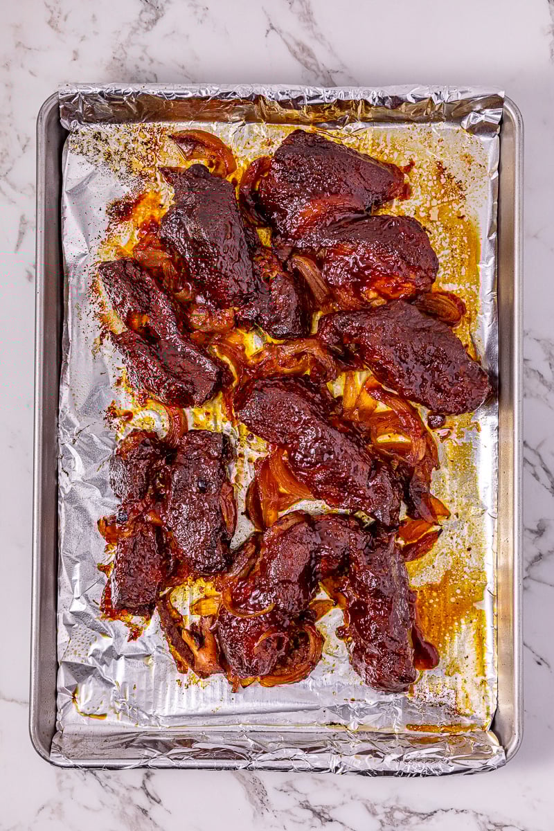 Broiled ribs with caramelized bbq sauce ready to serve.