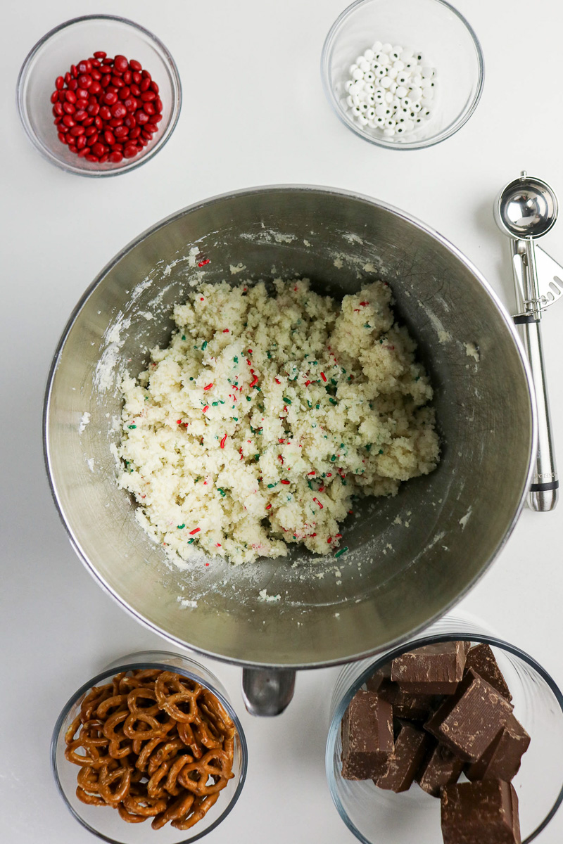 Crumbled cake mxture in mixing bowl.