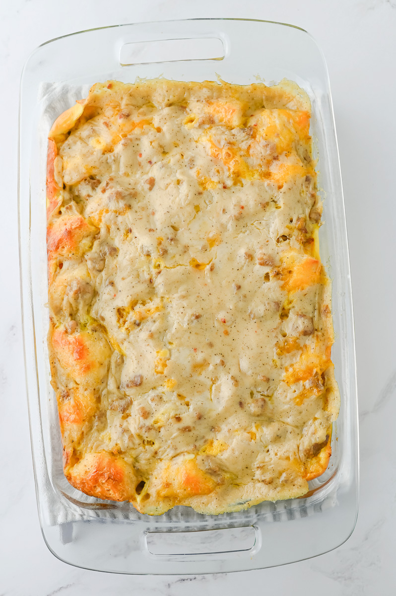 Baked sausage and gravy casserole in dish fresh from the oven.
