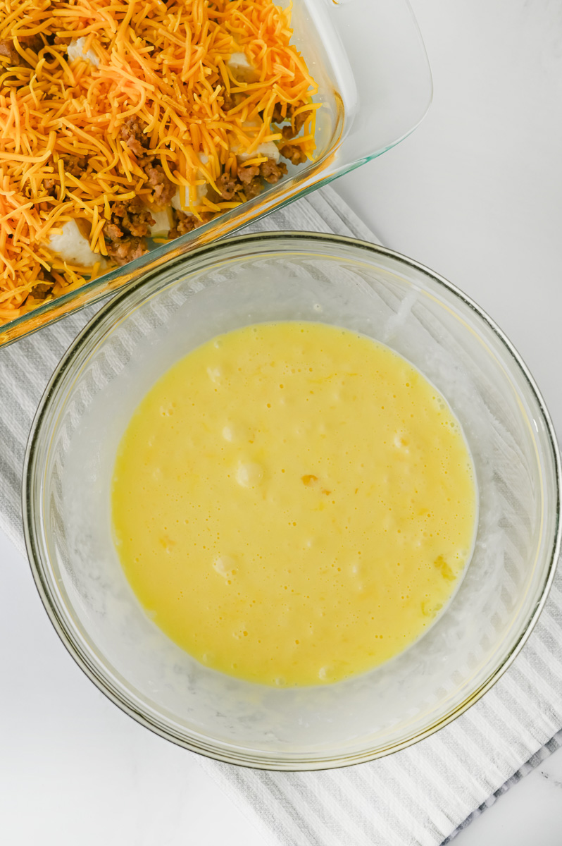 Whisked eggs in mixing bowl.