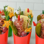 Christmas charcuterie cups prepared and ready to serve for a holiday party.
