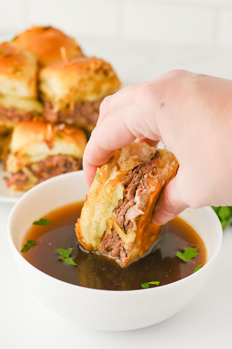Frenc dip sliders dipped into au jus gravy.