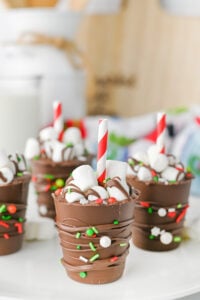 Hot chocolate on a stick on counter.