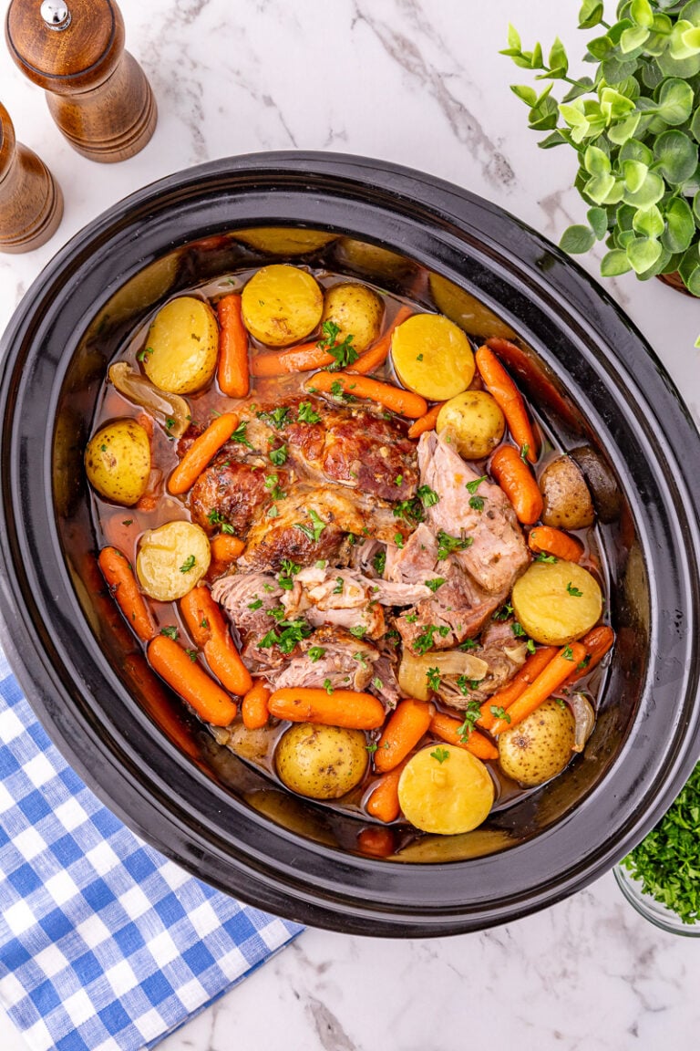 Crockpot pork roast overhead view in slow cooker.