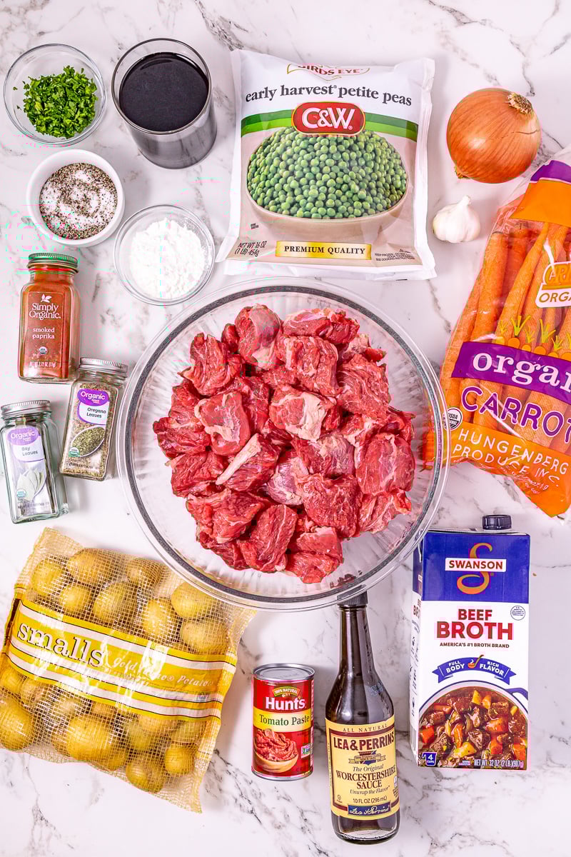 Ingredients for beef stew laid out on counter in preparation for the recipe.