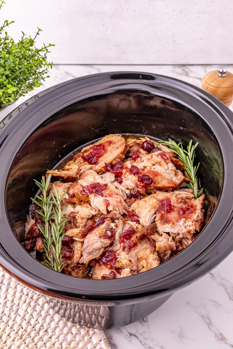 Shredded pork tenderloin in crockpot.