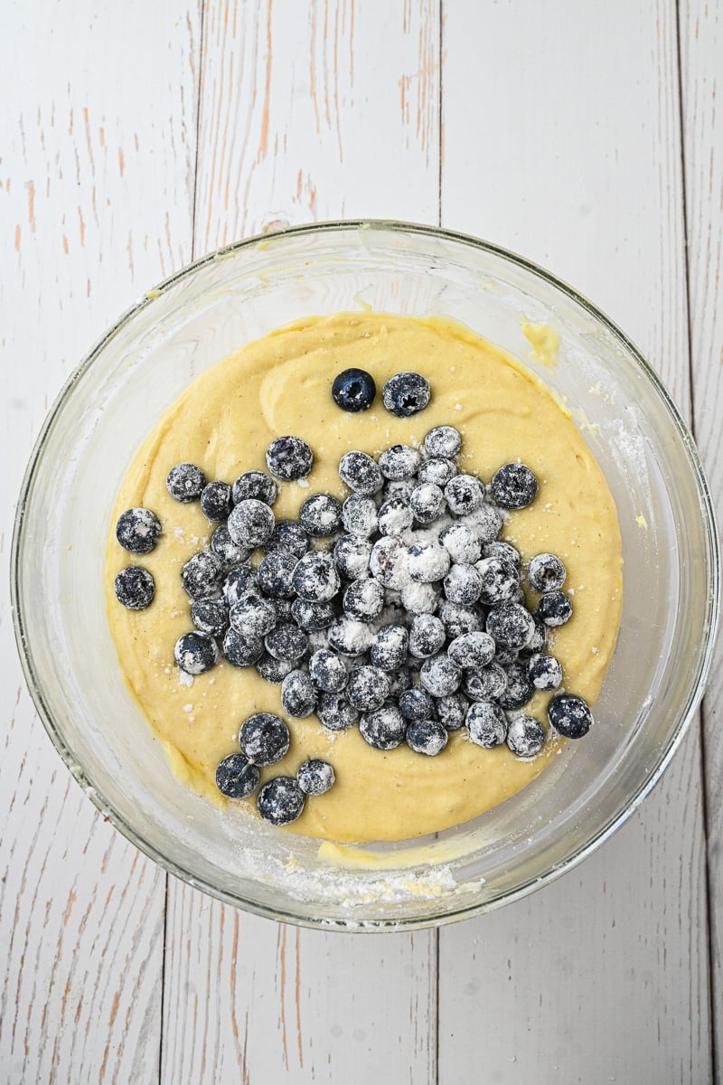 Blueberries are gently folded into the cake batter.
