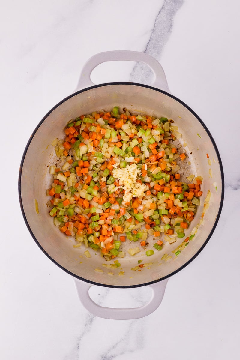 Vegetables in cooking pan.