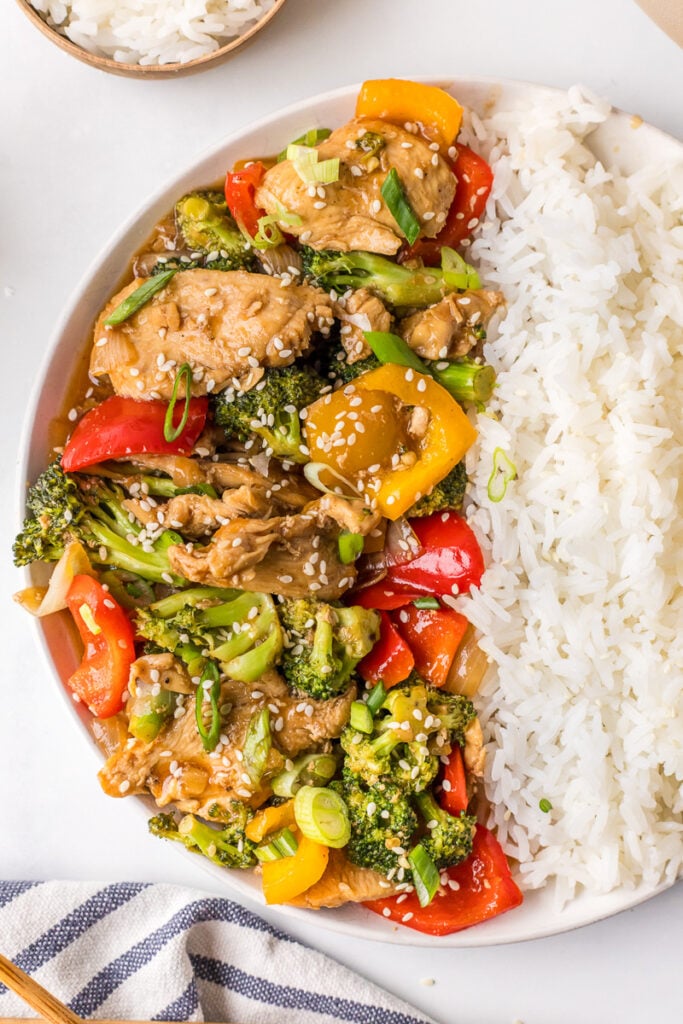 Chicken stir fry in skillet.