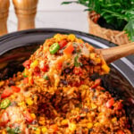 Mexican ground beef and rice casserole in crockpot ready to be served.