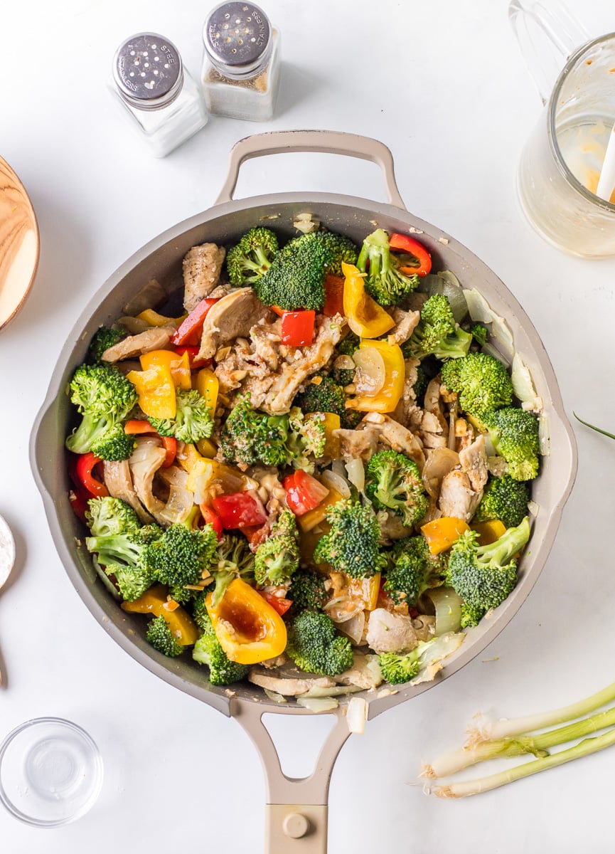 Overhead view of finished dish of chicken stir fry.