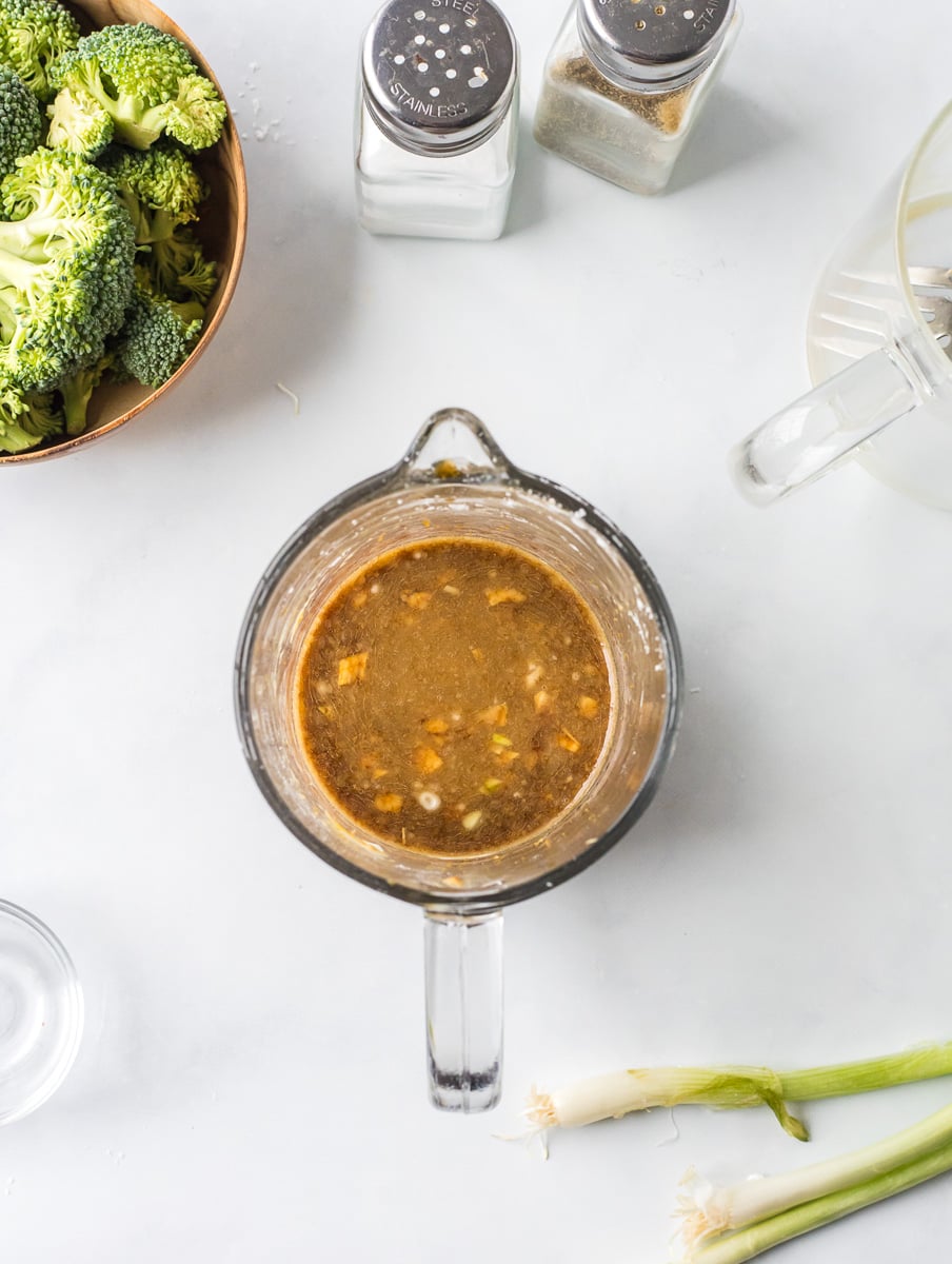 Mixed sauce ingredients for stir fry in mixing bowl.