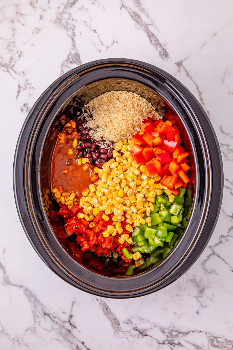 Remaining ingredients are added to the slow cooker.