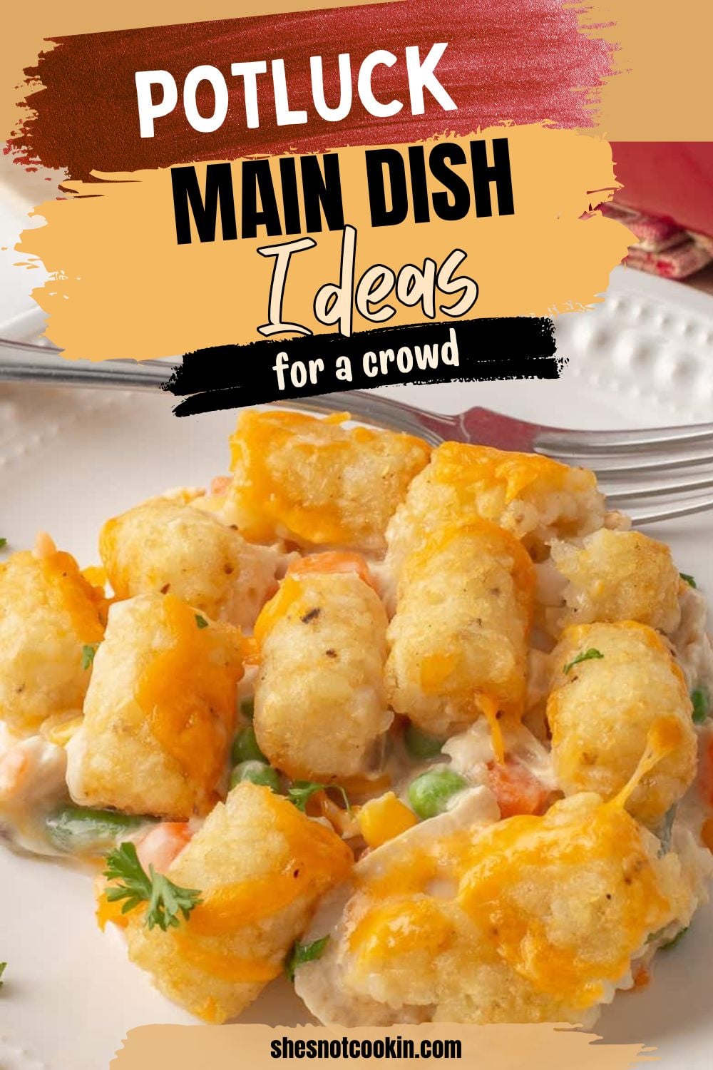 Chiceken tater tot casserole served on a white plate.