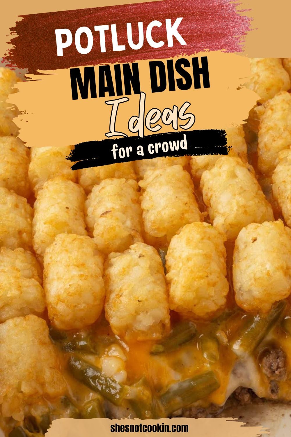 Ground beef tater tot casserole in casserole dish ready to be served.