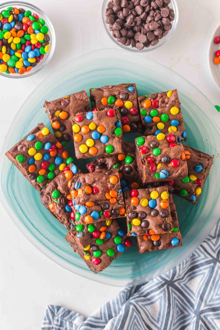 Overhead view of cake mix M&M brownies on a plate.