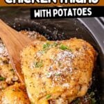 Creamy garlic parmesan chicken thigh scooped up on a serving spoon held over crockpot.