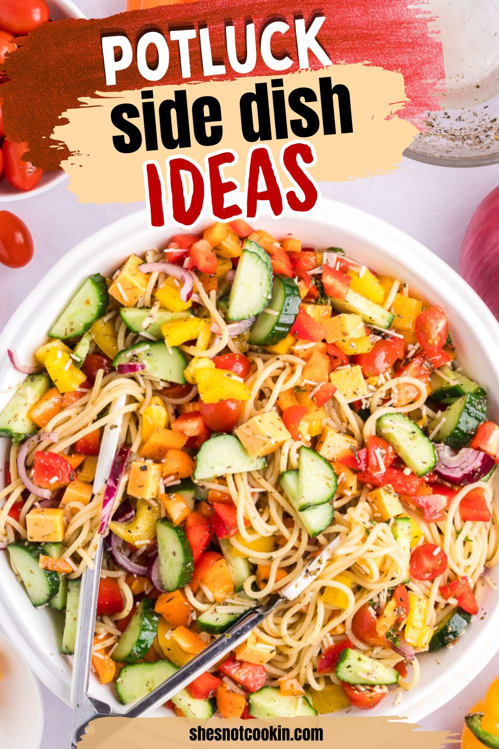 Spaghetti salad in a white bowl.