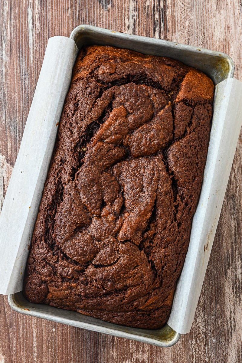 Baked banana bread in loaf pan.