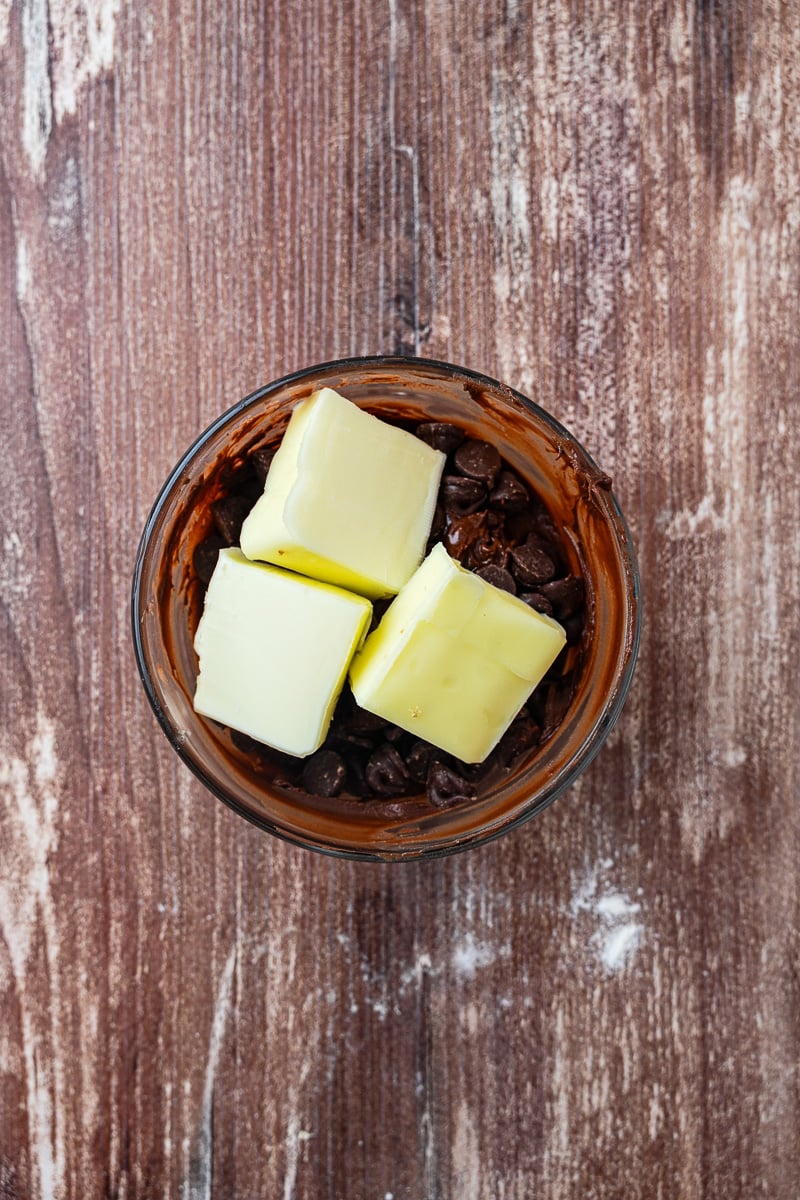 Chocolate chips and butter in small bowl.