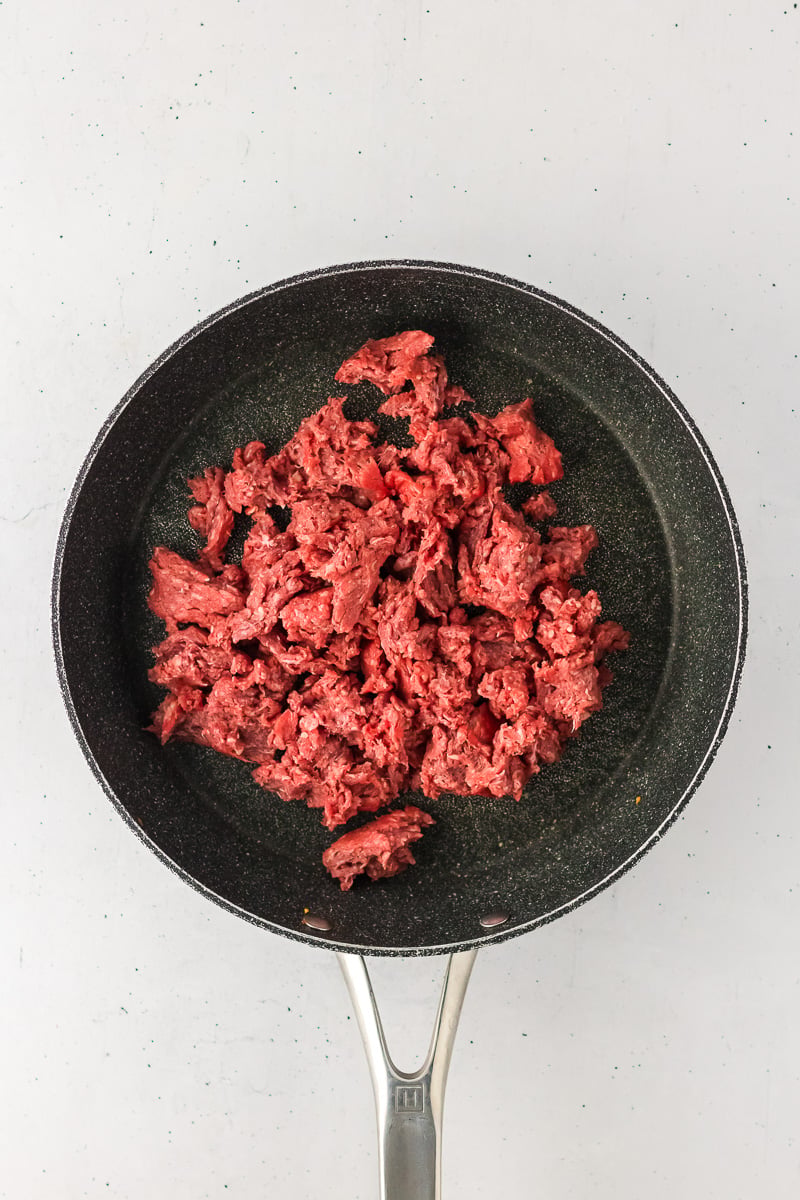 Ground beef in skillet.
