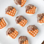 S'mores pretzel bites served on a plate.