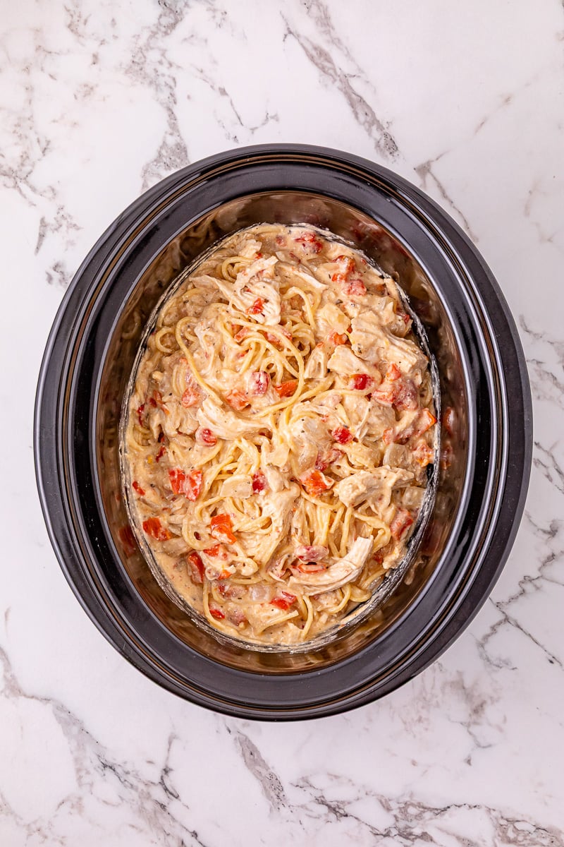 Finished dish of crockpot chicken spaghetti ready to be served.