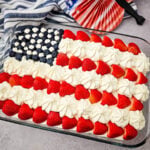 American flag cake on counter ready to be served.