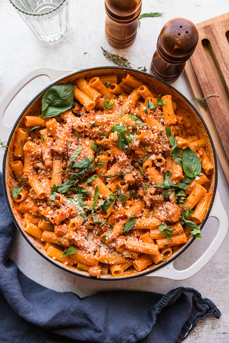 Creamy sausage rigatoni in skillet.
