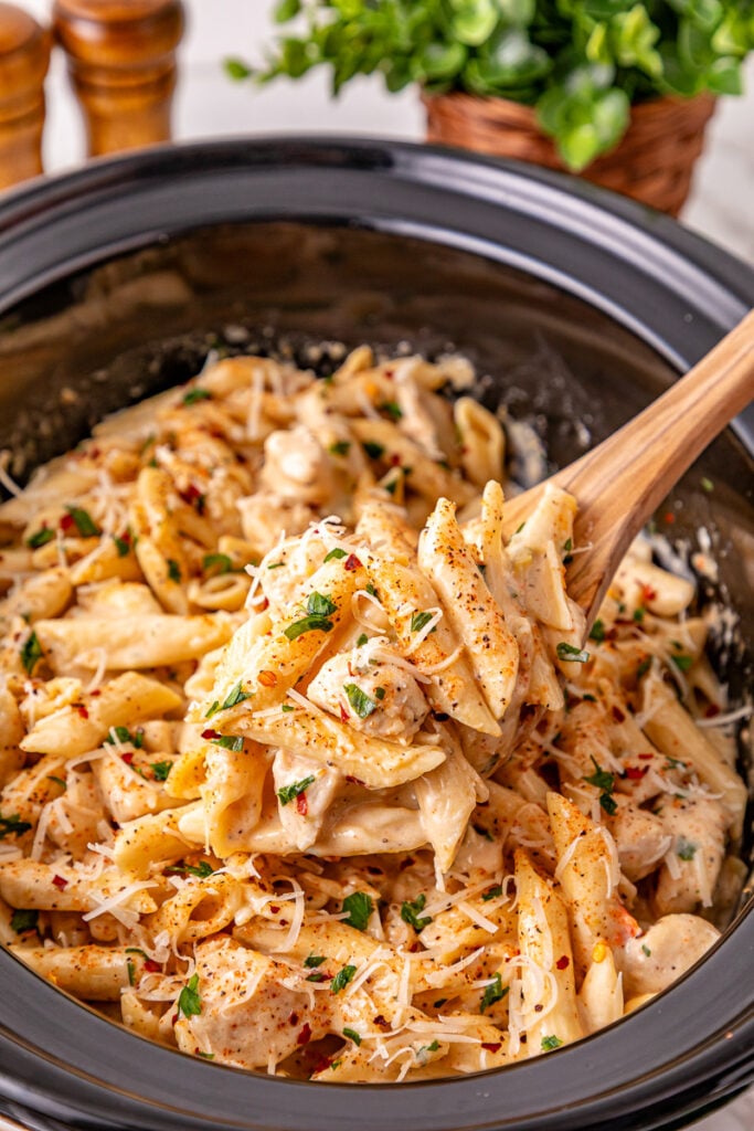 Crockpot cajun chicken pasta in slow cooker.