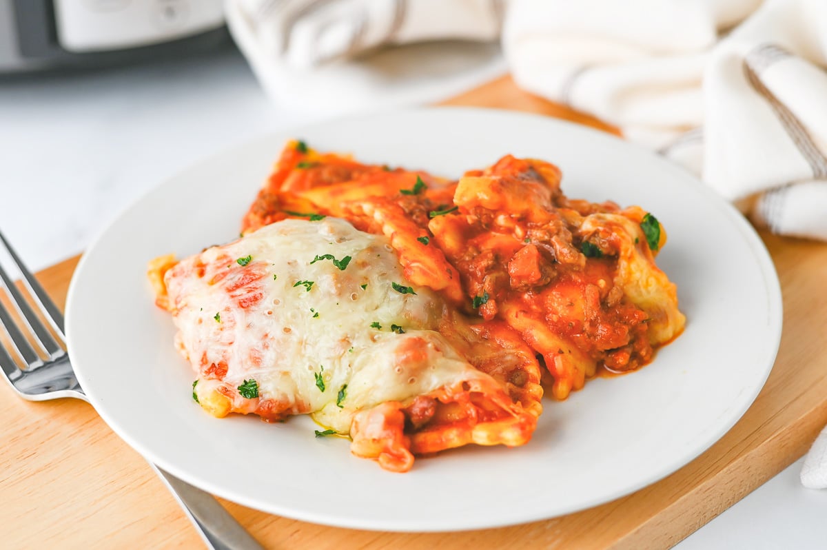 Ravioli lasagna served on a white plate.
