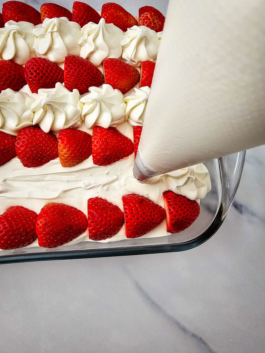 Stars are piped with icing bag using largest tip.