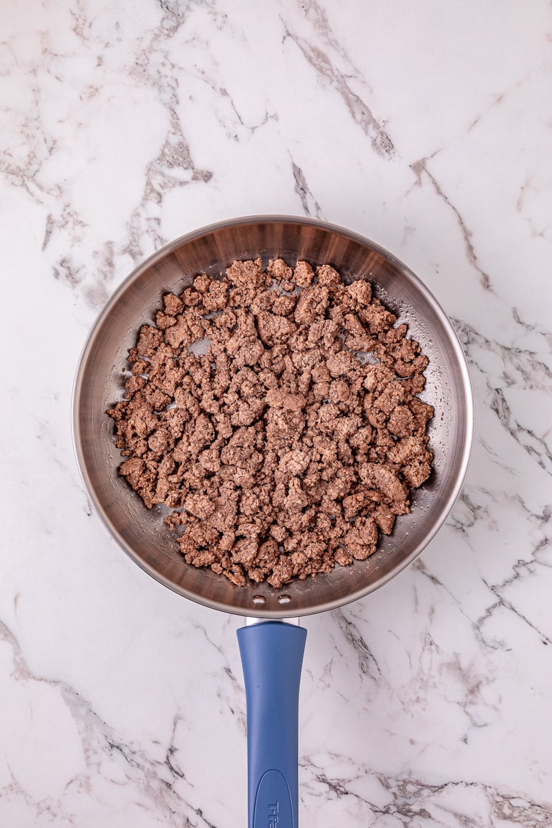 Ground beef in skillet.