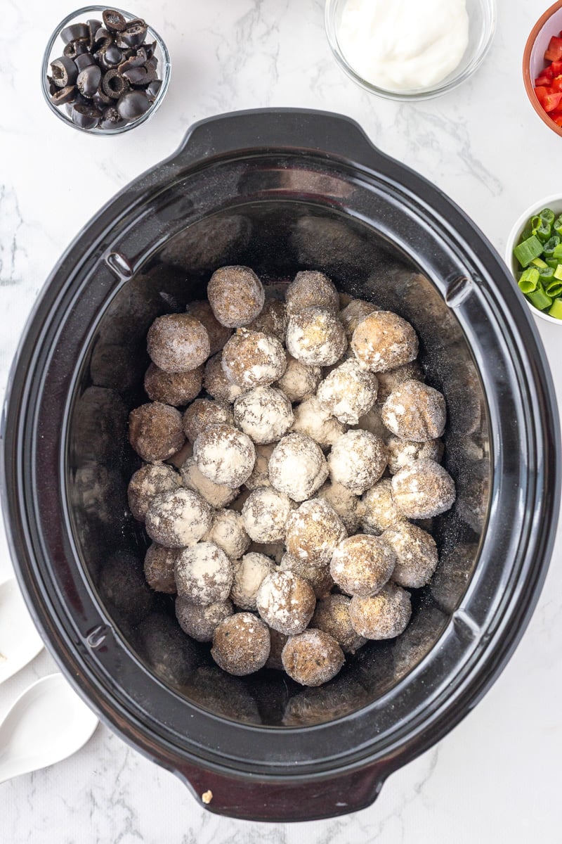 Frozen meatballs in slow cooker.