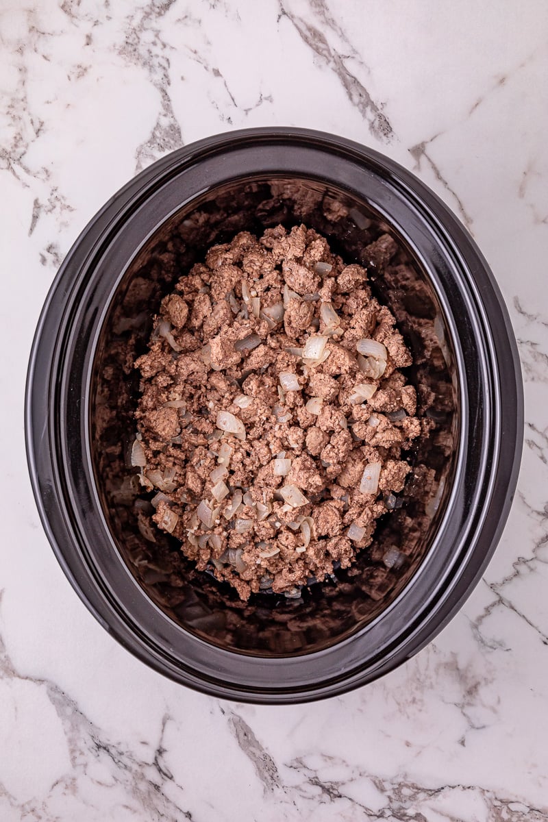 Ground beef mixture is placed in bottom of crockpot.
