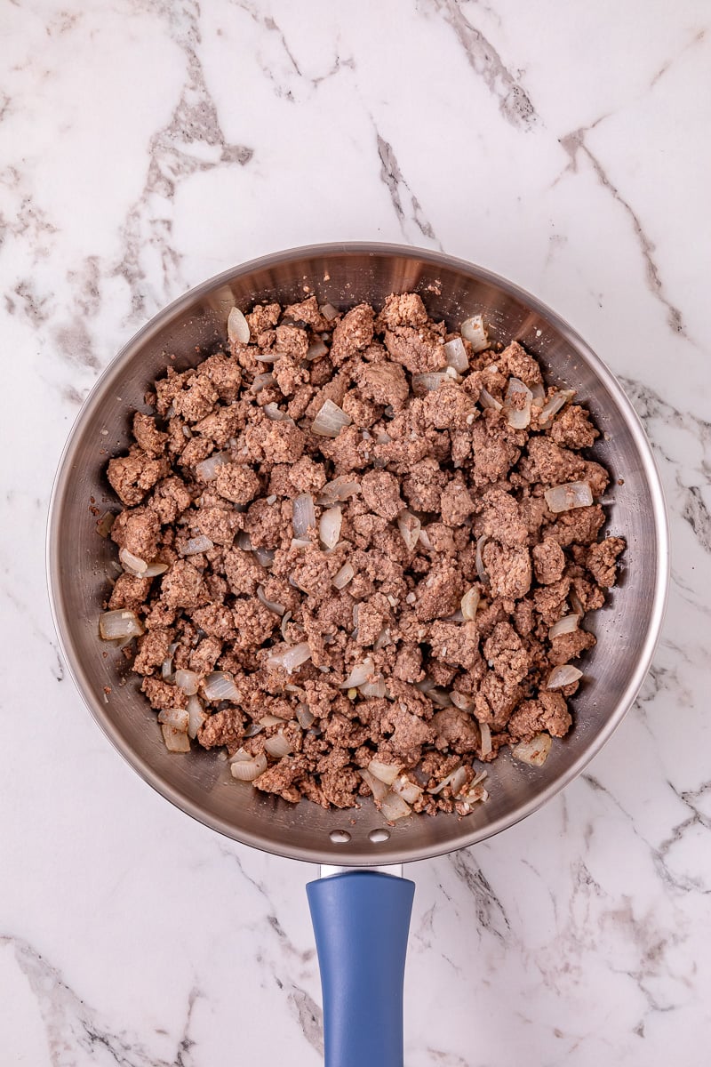 Ground beef in skillet.