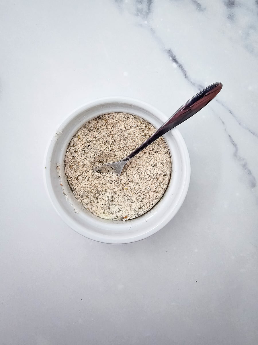 Seasonings for recipe in small bowl.