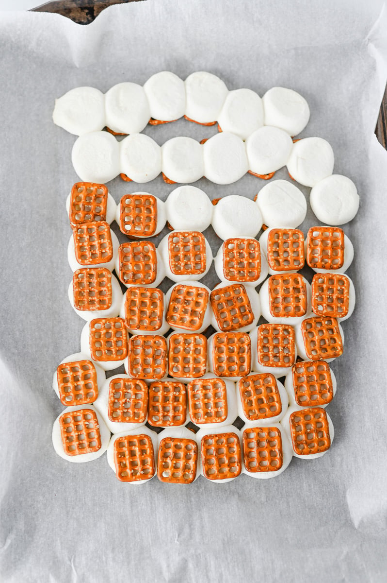 Another pretzel is added to the top of the marshmallow.
