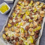 Sheet pan Mississippi chicken on baking sheet ready to be served.