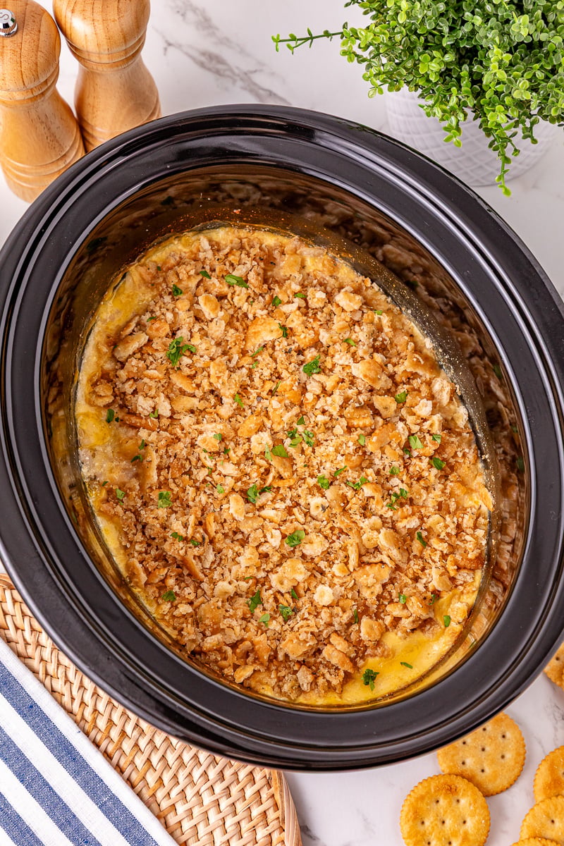 Finished casserole in slow cooker, ready to be served for a family dinner.