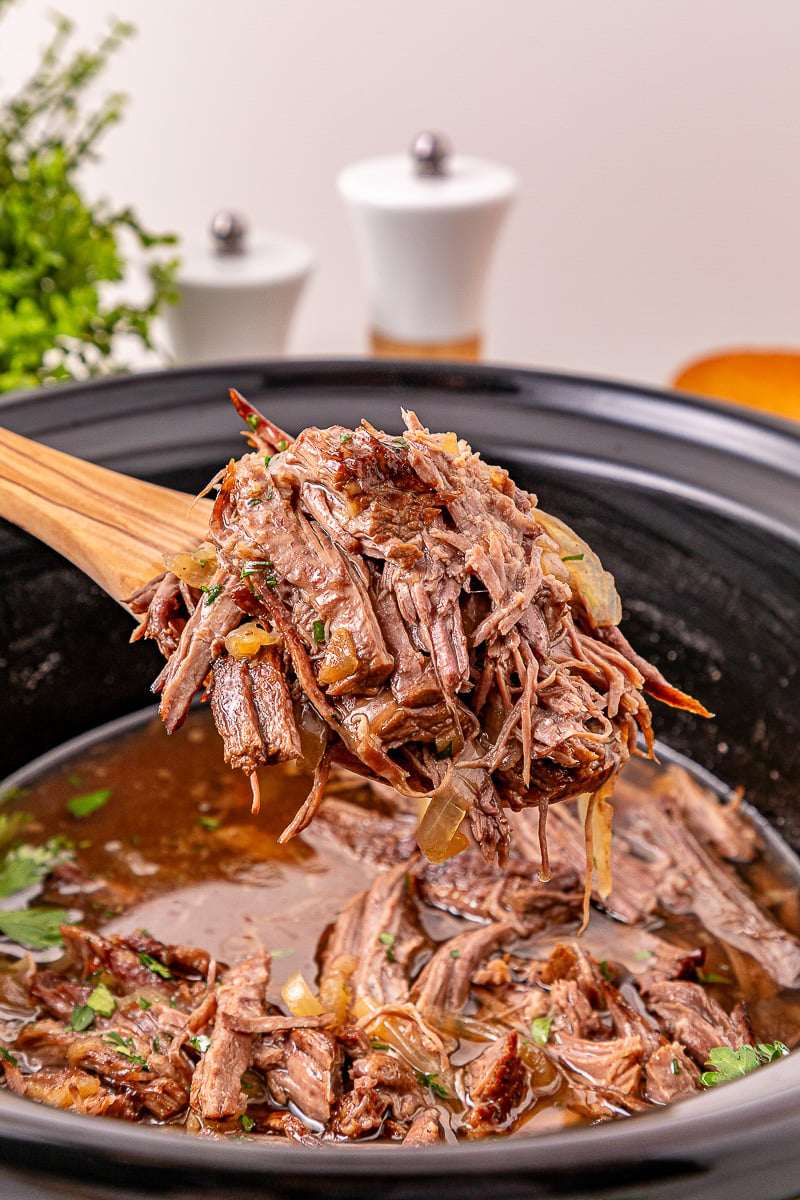 Beef is added back to au jus gravy.