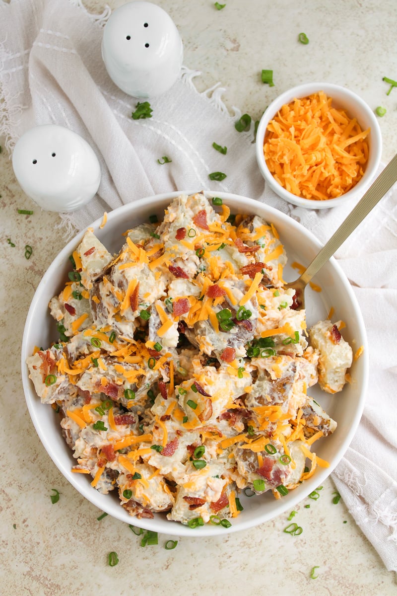 Finished dish of potato salad in bowl, ready to be served.