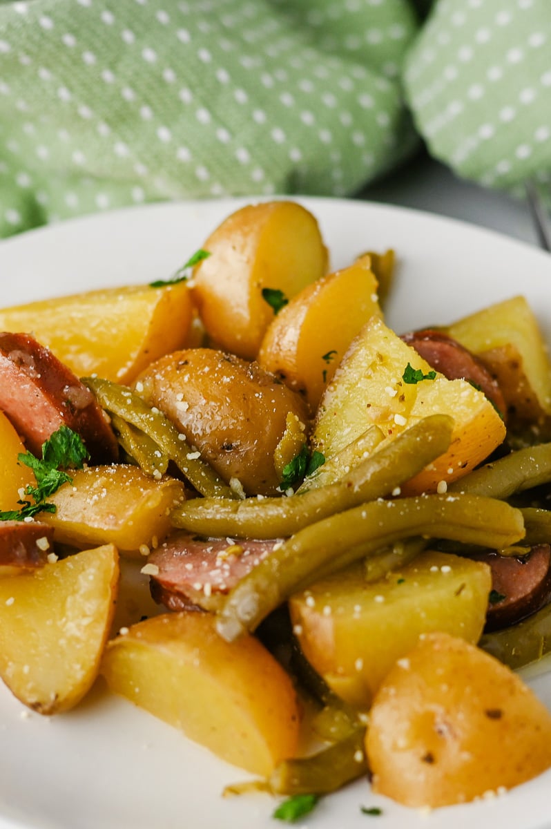Crockpot swamp potatoes served on a white plate.