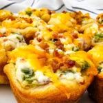 Jalapeno and bacon bites on a white plate.