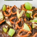 Caramel apple bark on a white plate.
